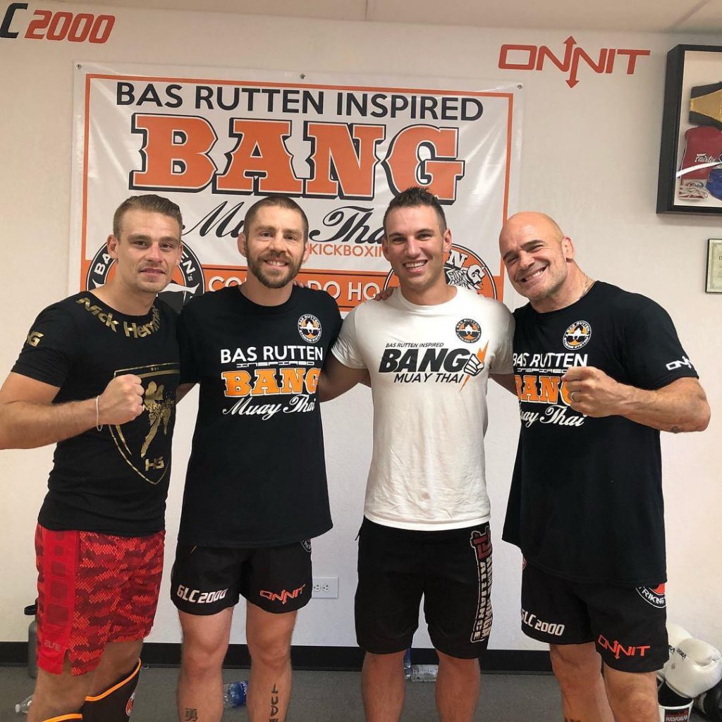 Coach Zach Evans with Bas Rutten, Duane Ludwig and another person